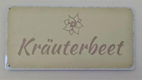 a sign that says keratectetter on a wall at Apartment Andrea - Chiemgau Karte in Inzell