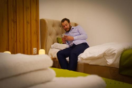Ένα ή περισσότερα κρεβάτια σε δωμάτιο στο Motel KVELE