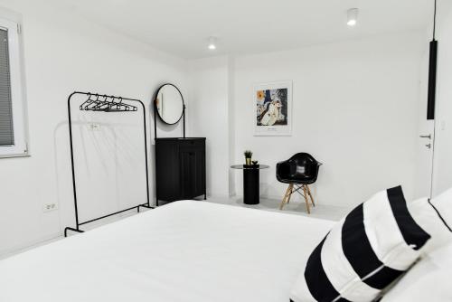 Ένα ή περισσότερα κρεβάτια σε δωμάτιο στο The View Boutique Apartments - Old Town