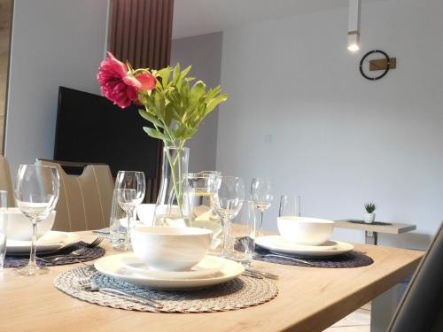 Telewizja i/lub zestaw kina domowego w obiekcie Apartament Zielone Wzgórze 1