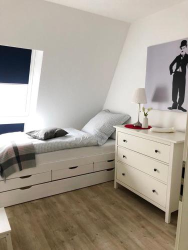 Ένα ή περισσότερα κρεβάτια σε δωμάτιο στο Apartment Nummer 5