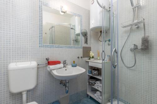 Kylpyhuone majoituspaikassa Apartment IN