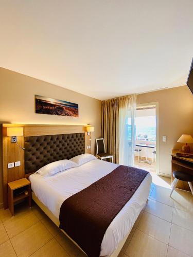 Ένα ή περισσότερα κρεβάτια σε δωμάτιο στο Hotel Tettola
