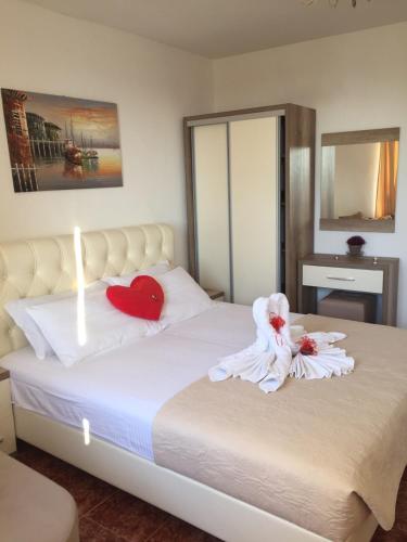 Ένα ή περισσότερα κρεβάτια σε δωμάτιο στο Apartments Gusar
