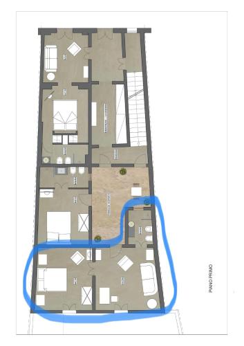 a floor plan of a house with a blue hose at La Casa di Bacco B&b in Alezio