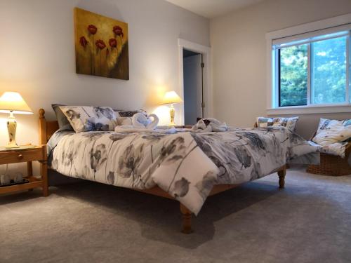 Postel nebo postele na pokoji v ubytování DELOVELY B&B