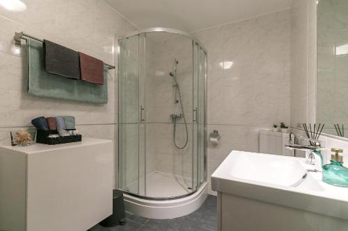 Koupelna v ubytování Apartments Dama