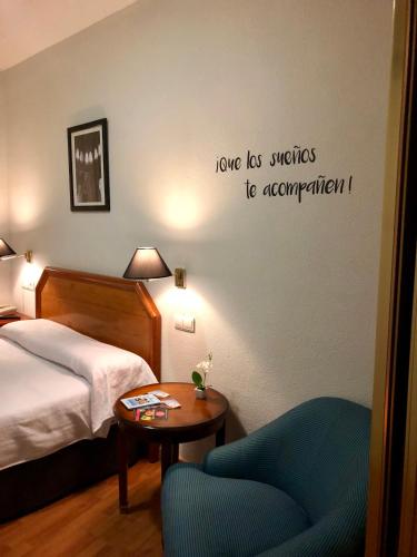 Кровать или кровати в номере Hotel Hispania