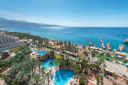 an aerial view of a resort and the ocean at Royal Beach Eilat by Isrotel Exclusive in Eilat