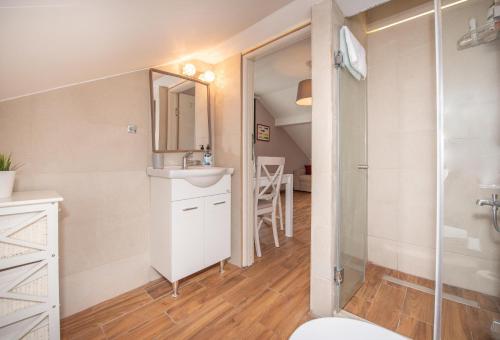 Kylpyhuone majoituspaikassa Ioannis Apartments