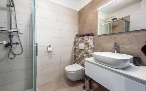 Koupelna v ubytování Apartment Sabbia