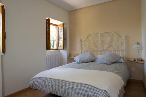 Posteľ alebo postele v izbe v ubytovaní Casa Rural La Casita del Río