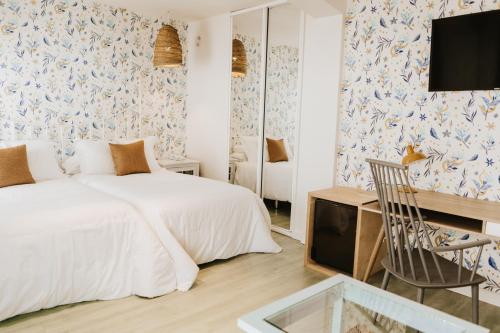 Hotel Mar Azul & Surfにあるベッド