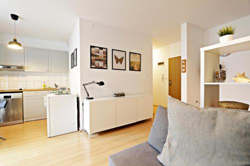 Kuchyňa alebo kuchynka v ubytovaní Ksiazat Pomorskich by Baltic Home