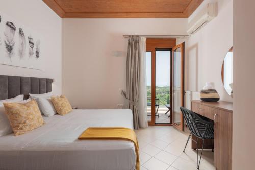 מיטה או מיטות בחדר ב-Tsourlakis Residence, an oasis of tranquility, By ThinkVilla