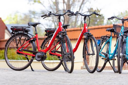 a group of three bikes parked next to each other at Hotel Villa Monte Vino in Potsdam