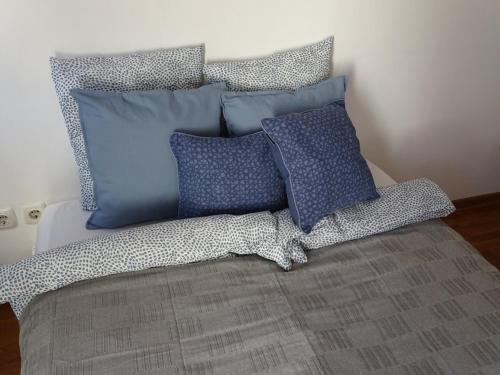 Postel nebo postele na pokoji v ubytování Blue Apartment