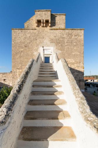 a set of stairs leading up to a castle at Galeta Masseria in Nardò