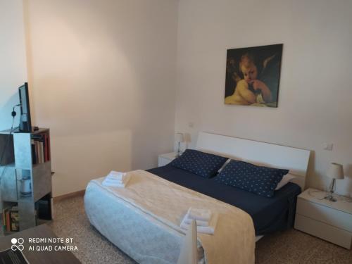 Postel nebo postele na pokoji v ubytování Bab San Feliciano Camere Foligno