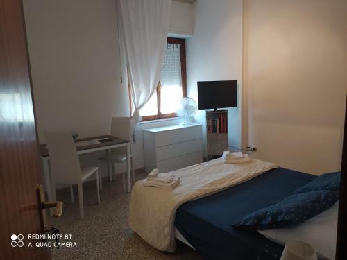 Postel nebo postele na pokoji v ubytování Bab San Feliciano Camere Foligno