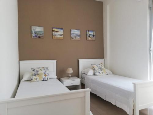 Postel nebo postele na pokoji v ubytování Casa Vacanze" Almarè"
