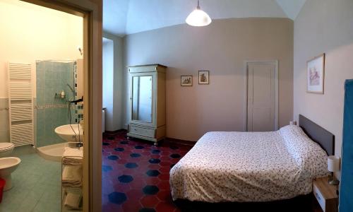 Кровать или кровати в номере La Fornace