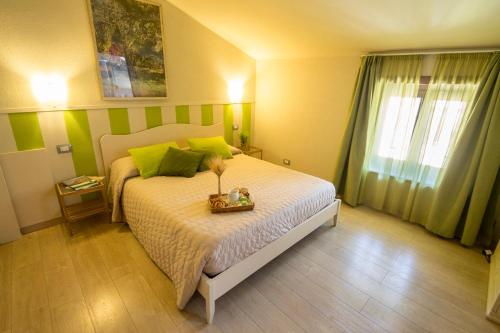 Letto o letti in una camera di B&B Antiche Mura