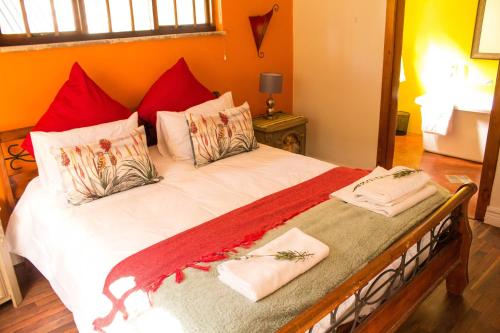 Una cama o camas en una habitación de Hidden Gem Art Guesthouse , one of a kind