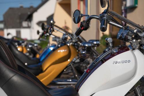a row of motorcycles parked next to each other at Landhaus Heimisch Bed & Breakfast in Geisfeld