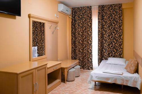 Ένα ή περισσότερα κρεβάτια σε δωμάτιο στο Villa Marija - Izgrev