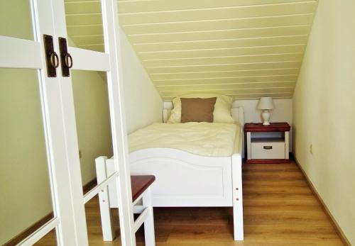 Postel nebo postele na pokoji v ubytování Landhaus Petra - Die kleine Ferienvilla