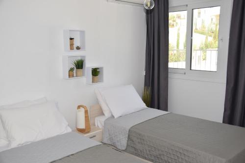 Krevet ili kreveti u jedinici u objektu Tala Luxury apartments with pool by Raise