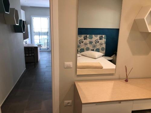 Ένα ή περισσότερα κρεβάτια σε δωμάτιο στο Drimades Blue Rooms