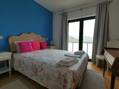 En eller flere senge i et værelse på Gerês e Cabreira - Casa Alexandrina Vilar