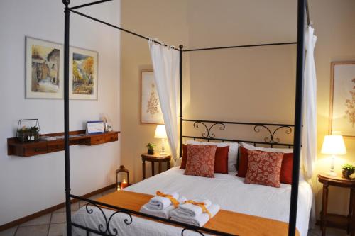 A bed or beds in a room at My Suite Home - Riva del Garda