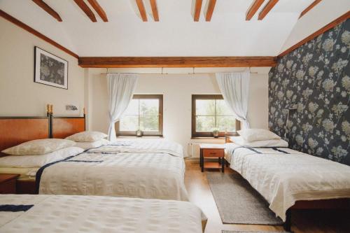 Llit o llits en una habitació de Podkowa Modliszów