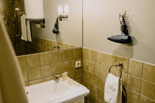 
Ванная комната в Plaza Hotel
