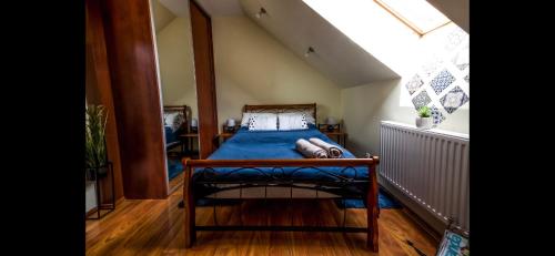 Ένα ή περισσότερα κρεβάτια σε δωμάτιο στο Apartament z widokiem