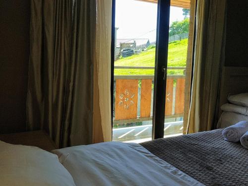 Ένα ή περισσότερα κρεβάτια σε δωμάτιο στο Villa A Barleon Bakuriani