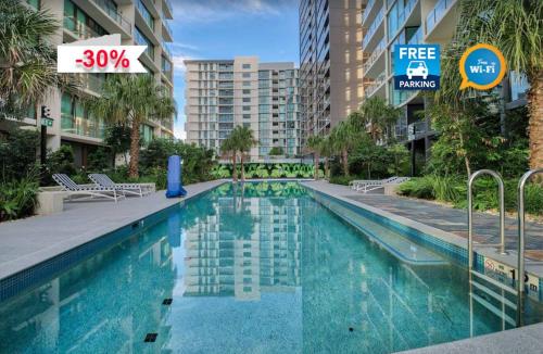 a swimming pool in the middle of a building at Perfect short term stay in Brissy Cozy & Relax in Brisbane