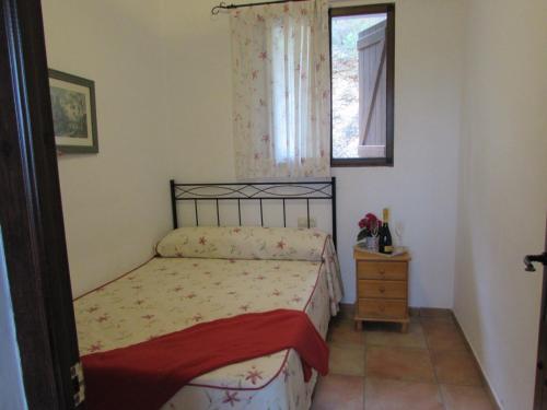 Een bed of bedden in een kamer bij Casa Rural La Canal De Salem