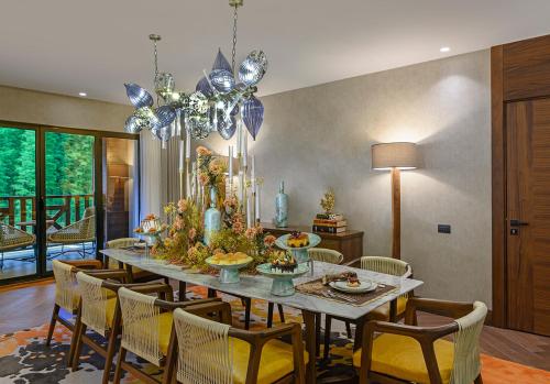 a dining room with a table and chairs at Elite World Grand Sapanca in Sapanca