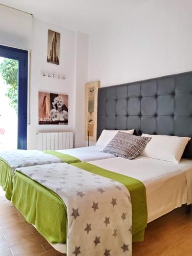 Postel nebo postele na pokoji v ubytování Apartment Sant Sebastià