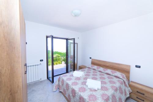 Una cama o camas en una habitación de Residence Fortunato