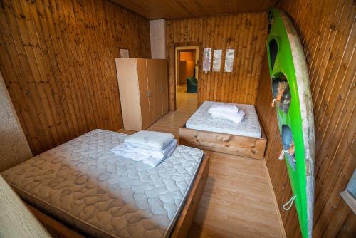 an overhead view of a room with two beds at Hostel Paradiso in Tolmin