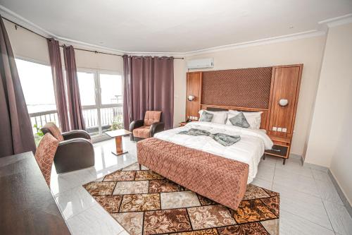 Postel nebo postele na pokoji v ubytování Fini Hotel Bobende