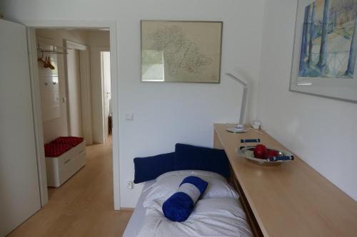 Llit o llits en una habitació de kleine Ferienwohnung am Wulfkamp