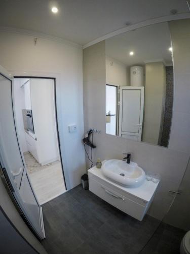 Koupelna v ubytování Apartments Tila