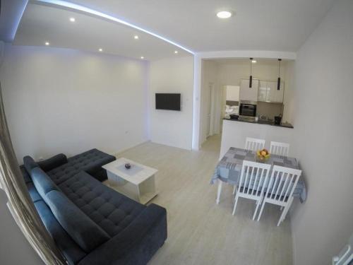 Kuchyň nebo kuchyňský kout v ubytování Apartments Tila