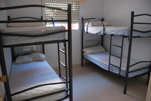 Posteľ alebo postele v izbe v ubytovaní Albergue de San Jose
